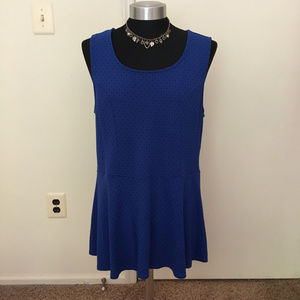 Torrid blue polka dot peplum top with cutout